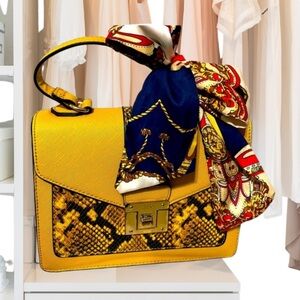 Aldo bag with scarf. Mustard color w/faux snake skin. Comes w/detachable strap